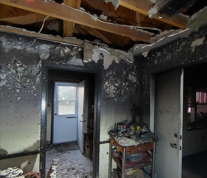 Hanging debris, fire damage attic