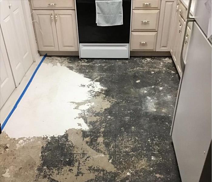 removed floor tiles in kichen area