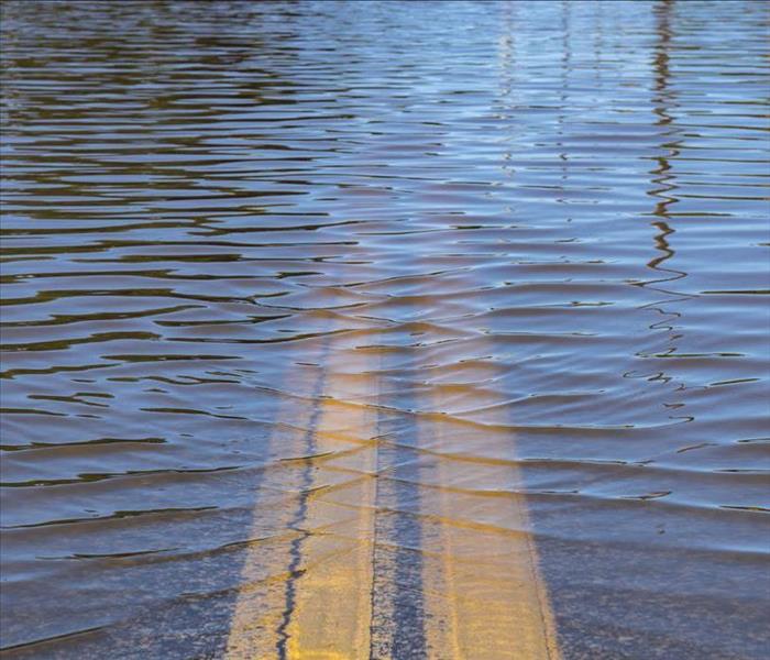 flooded road with lane paint